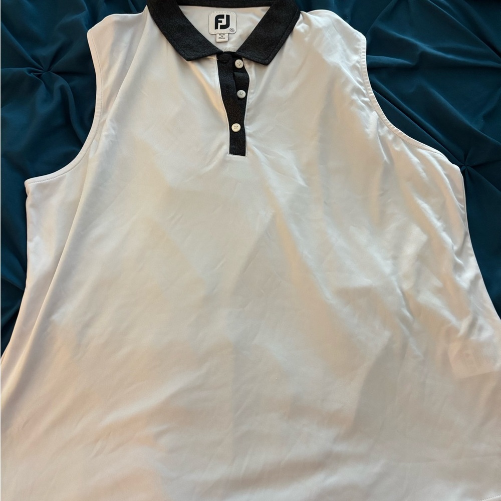 FootJoy Women White and  Black Collar sleeveless golf shirt.